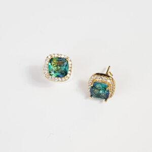 18k gold combination with cubic zirconia. Square shape.